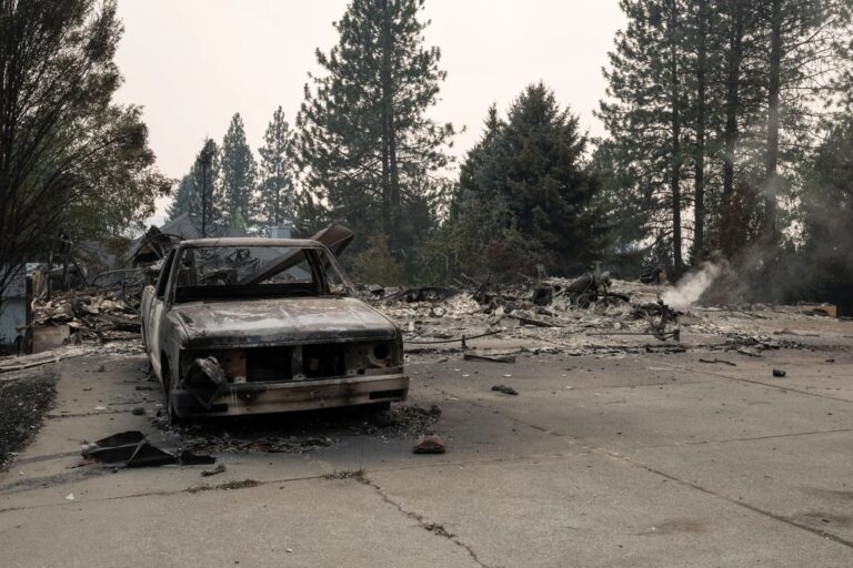 Damage home and auto from Spokane Fire
